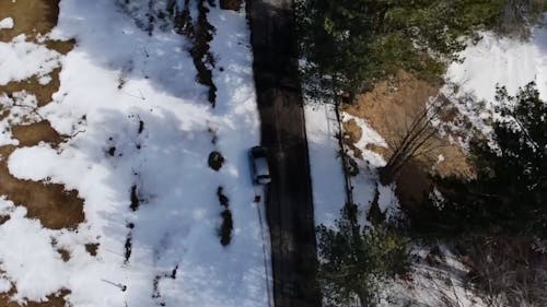 Drone Footage of a Road in the Forest 