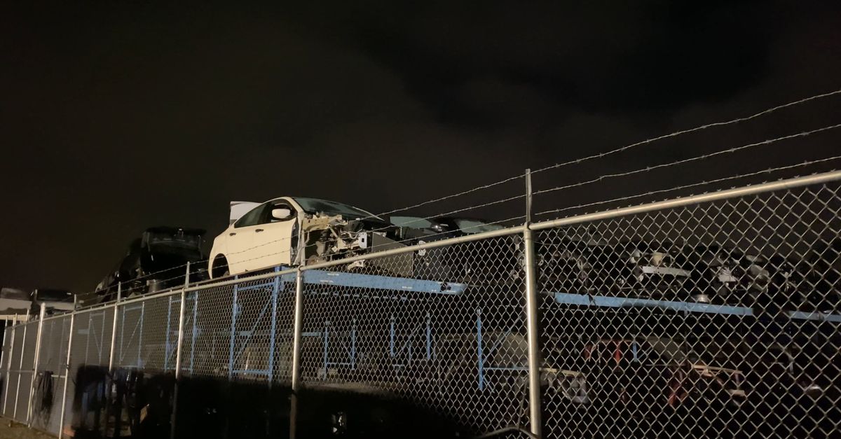 Elevated Cars On A Junkyard At Night Free Stock Video Footage Royalty elevated-cars-on-a-junkyard-at-night-free-stock-video-footage-royalty