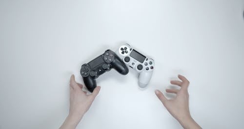 Grabbing The Wireless Controllers Of A Game Console