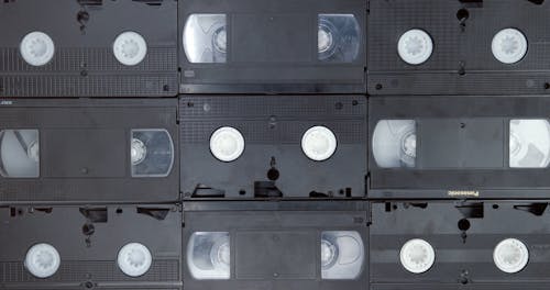 Showing The Front And Back Of Video Home System Tapes Cartridge