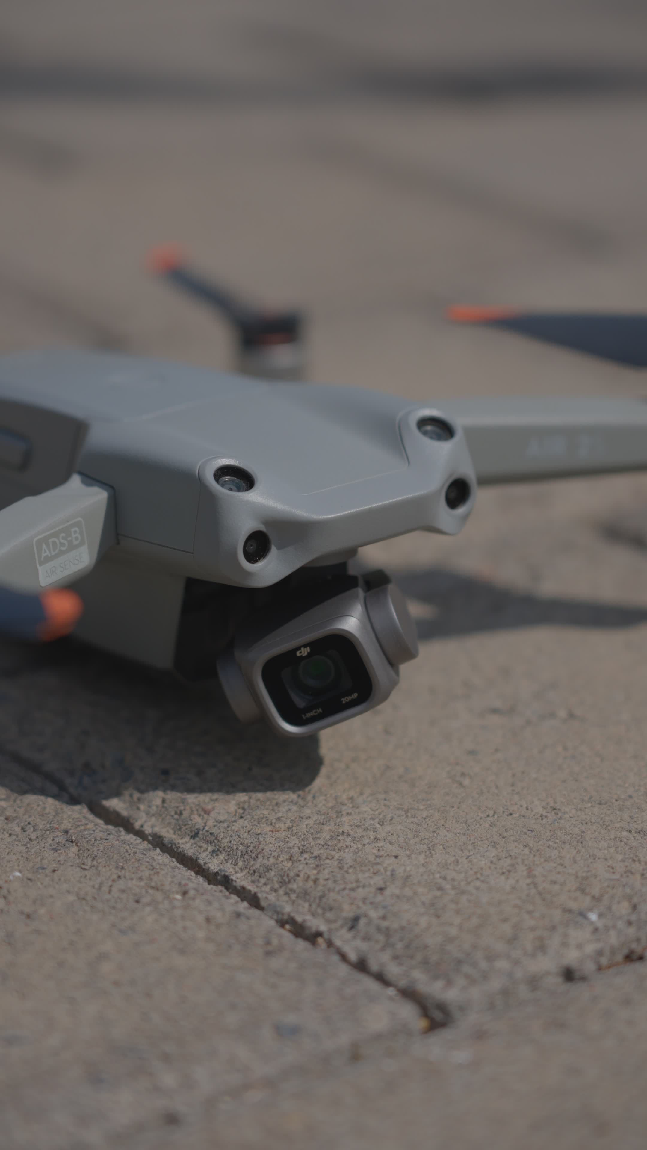 Close-up of drone resting on pavement surface Free Stock Video Footage ...