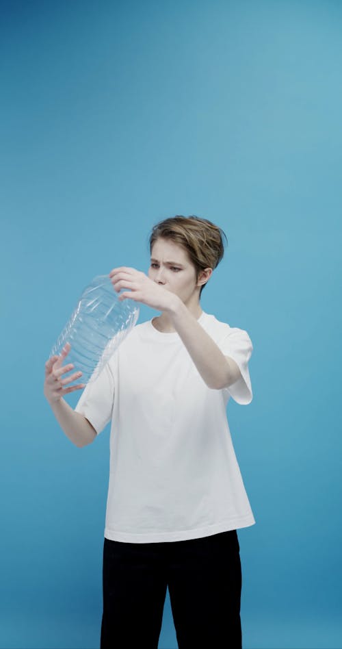 A Woman Looking Curious On A Do It Yourself Protective Gear From A Plastic Container 