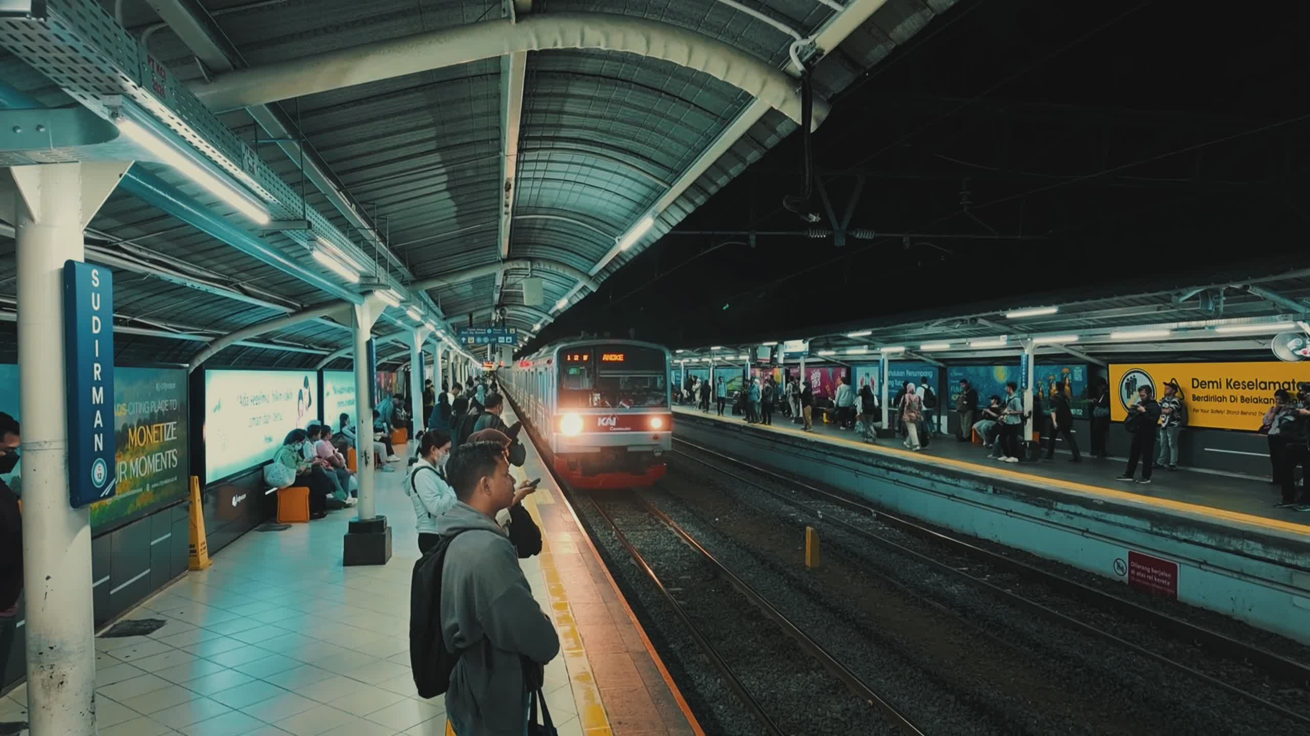 Evening Train Arrives at Busy City Station Free Stock Video Footage ...