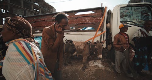 People Trading Goods In The Market