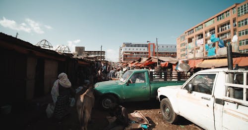 Parked Cars on a Public Market