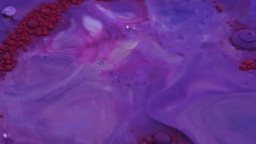 Reactions Of Mixing Different Colored Liquid And Paints