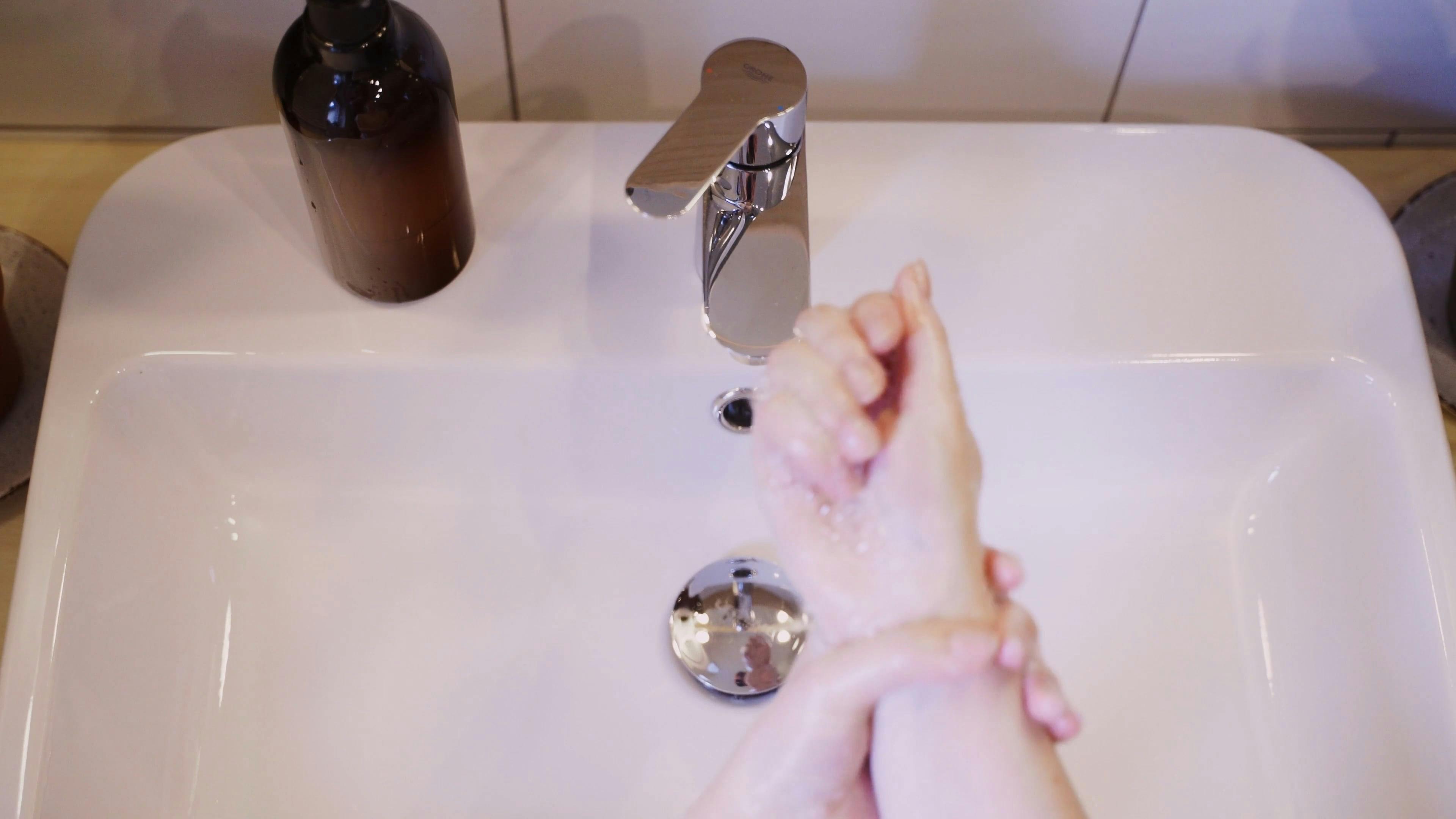 A Person Washing Hands With Soap And Water · Free Stock Video