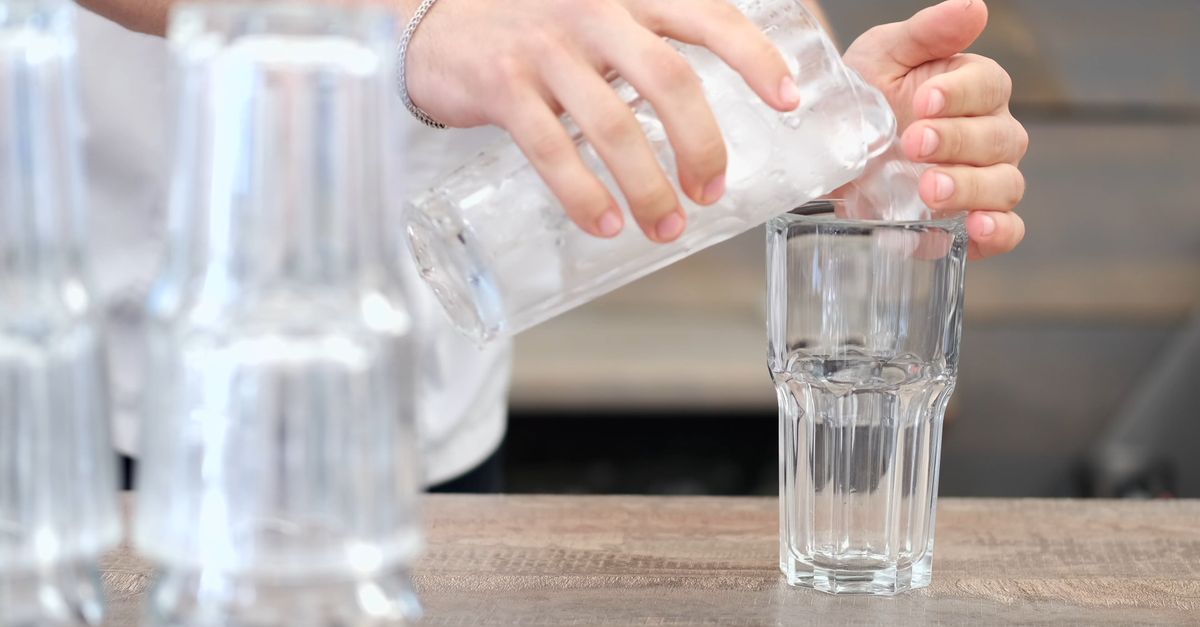 Placing Ices Person Putting Ice in a Drinking Glass Free Stock Video Footage ...