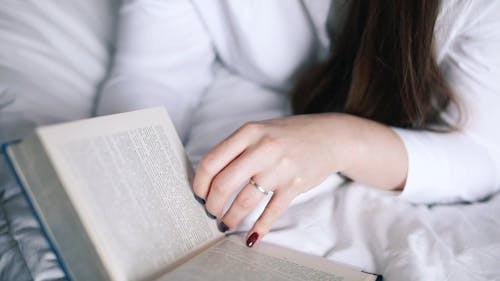 A Person Reading A Book