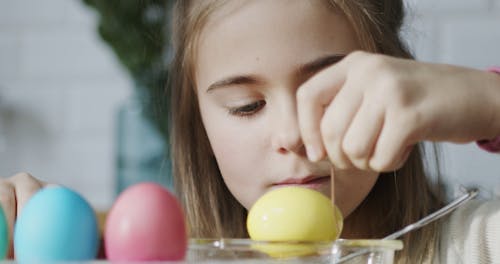 Drying Color Dyed Eggs Over A Tray