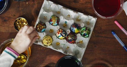 Sprinkle Of Gold Glitters As Decor For Easter Eggs