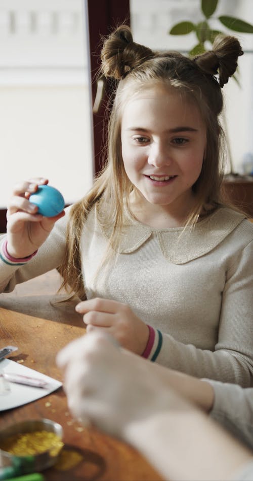Kids Playing With Colored Easter Eggs