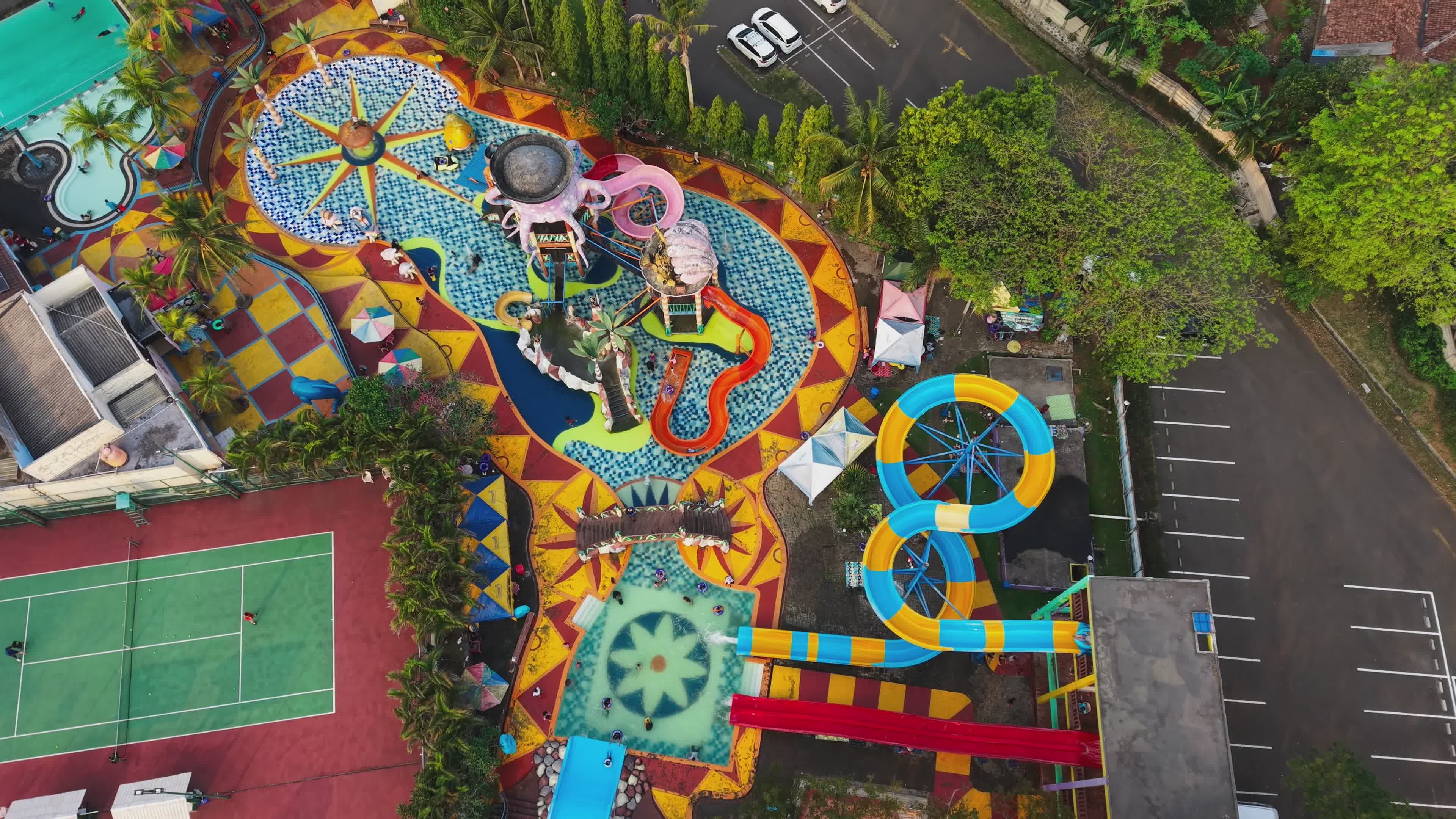 Aerial View of Vibrant Waterpark in Tropical Setting Free Stock Video ...