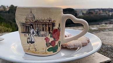 close up shot of a mug and biscuits