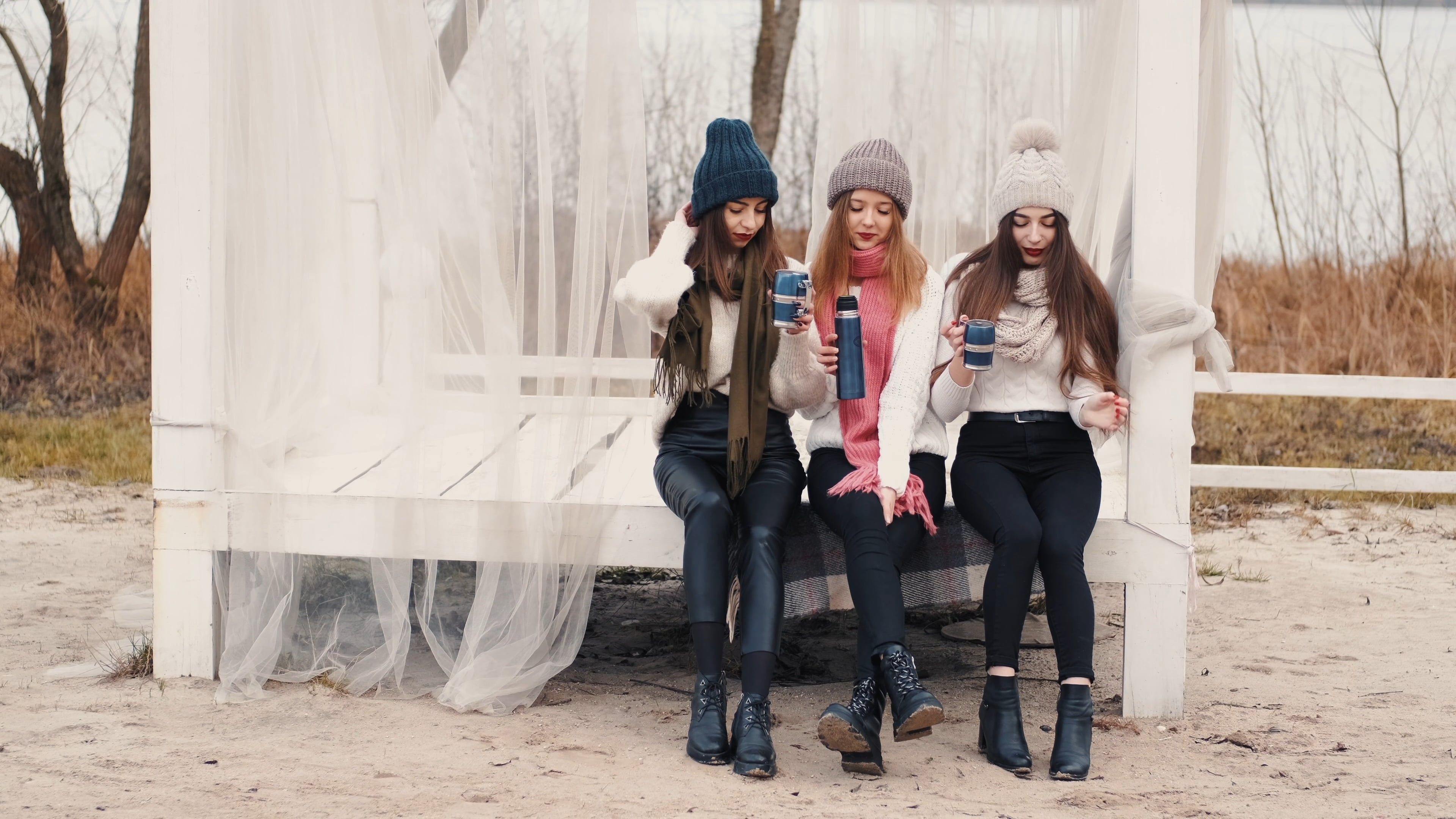 Beautiful Women Sitting Outdoors · Free Stock Video