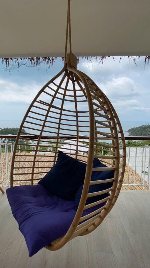Swinging Chair Hanging in a Balcony