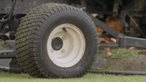 An Agricultural Machinery In Grass Field