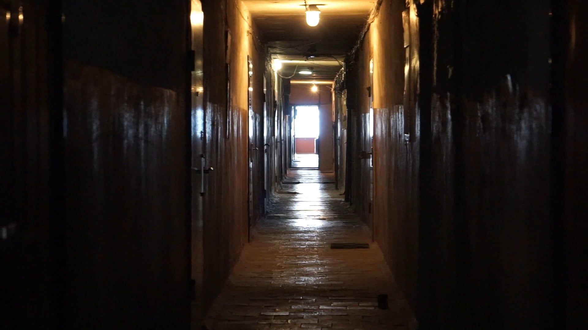 A Person Walking Down A Hallway Free Stock Video