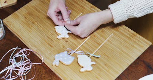Tying Ribbons On Easter Bunny Cake Decors