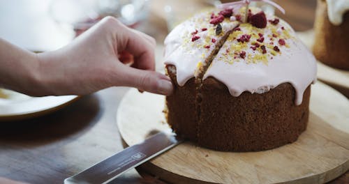 Placing A Slice Of Cake Over A Saucer Plate