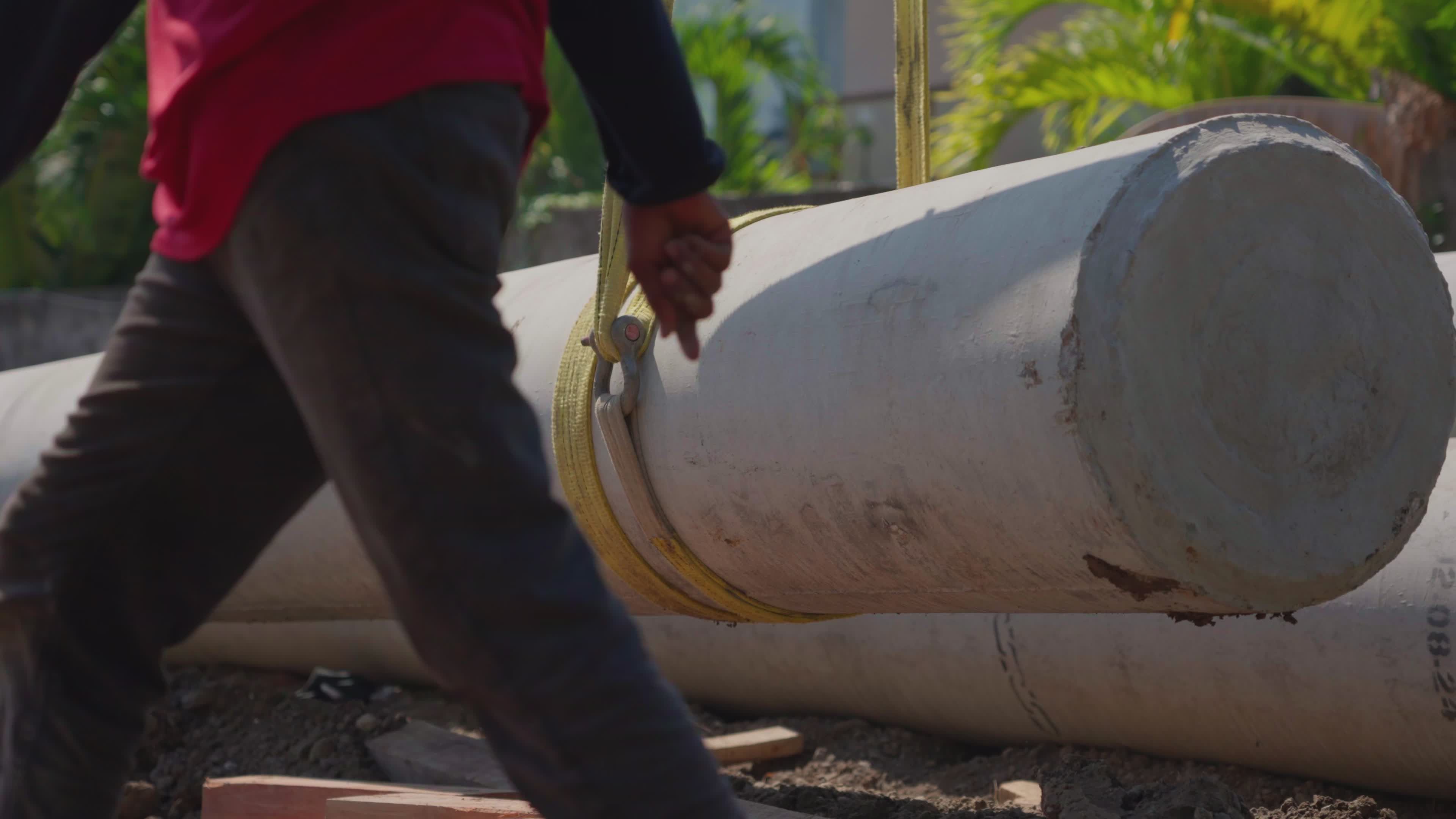 Construction Site with Lifting Concrete Pipes Outdoors Free Stock Video ...