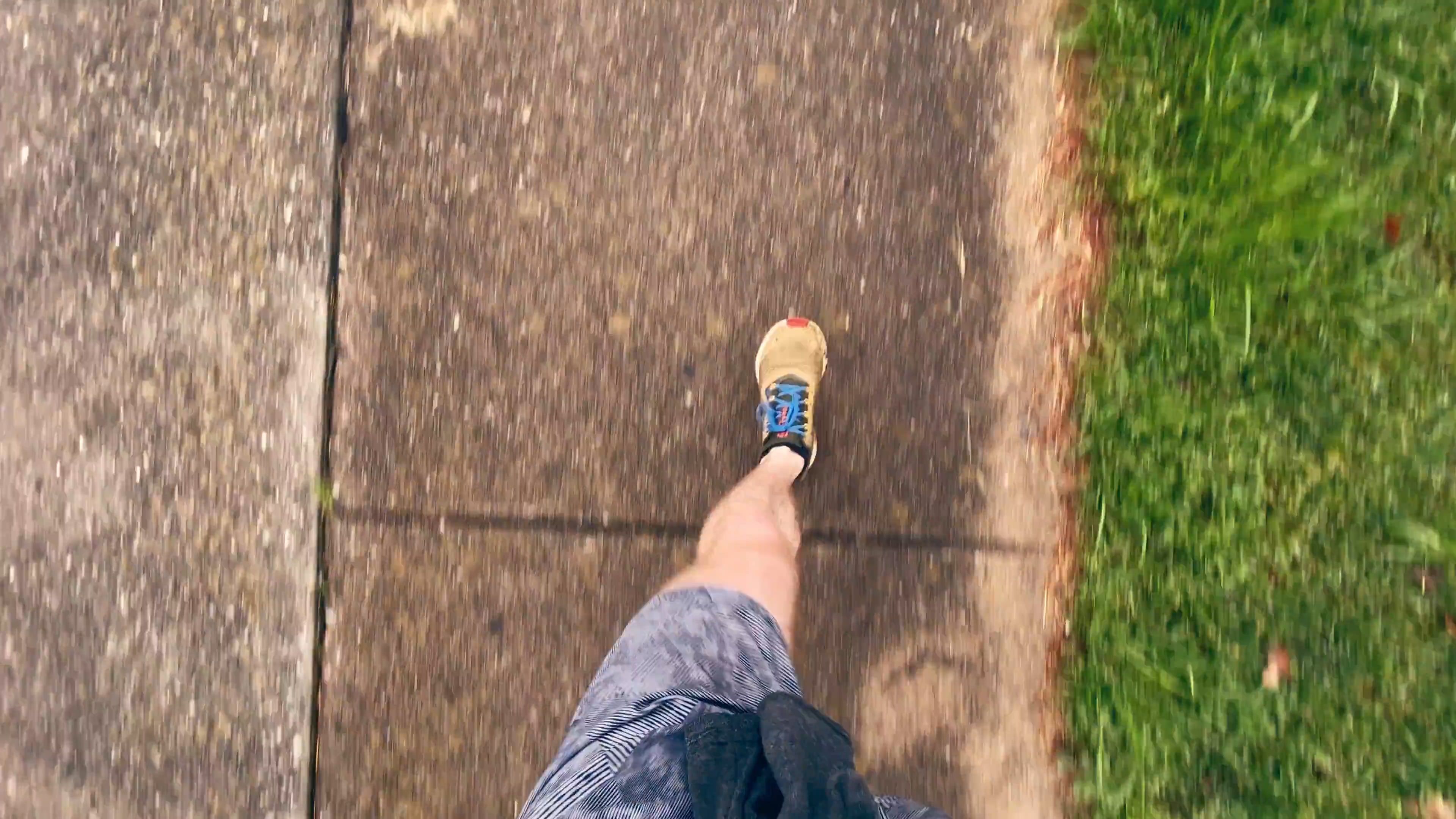 A Person Rushing To Cross A Road On The Pedestrian Lane Free Stock ...