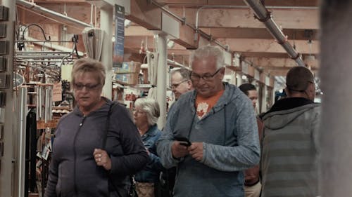 A Crowd Of People Visits The Farmer's Market In Canada