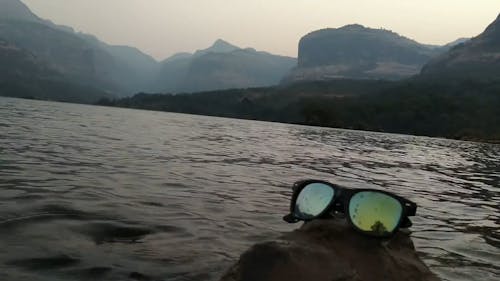 Sunglasses on a Rock
