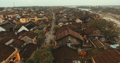 Drone Footage Of A Crowded Street Of A Dense Community