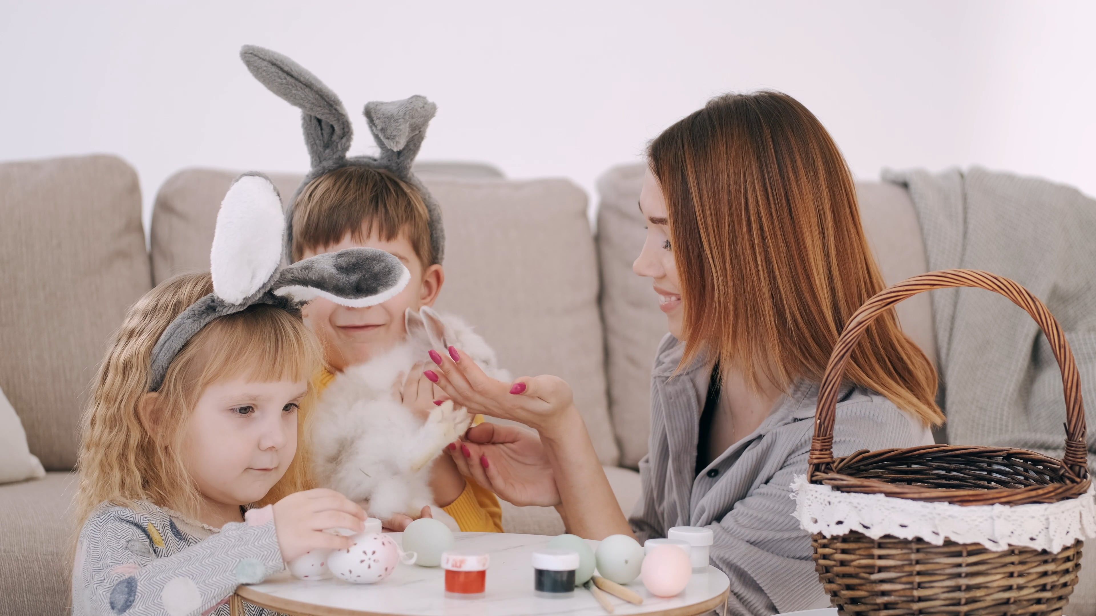 Children Playing and Holding a Rabbit with a Woman Free Stock Video ...