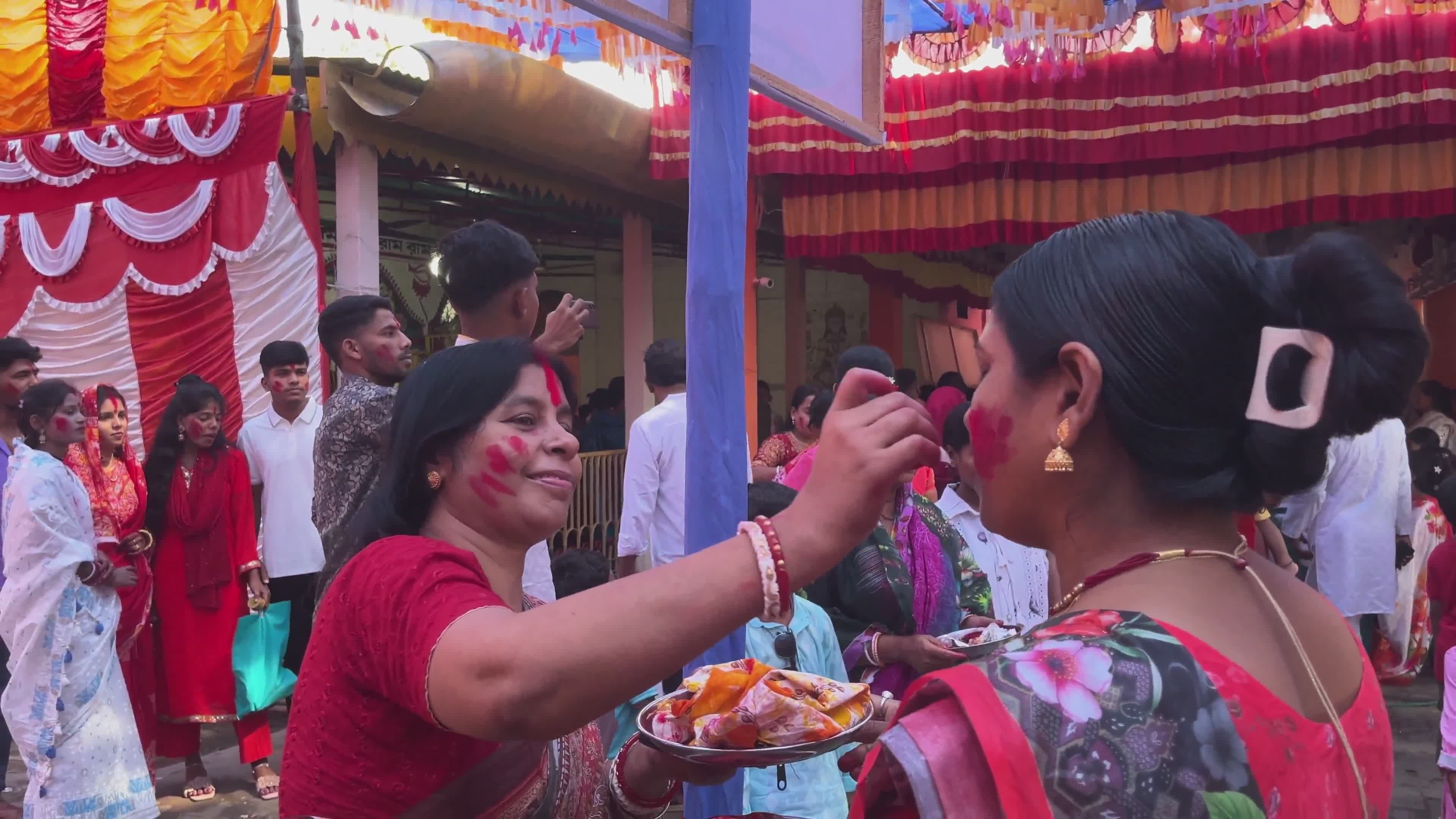Joyful Festival Celebration with Women Embracing Free Stock Video ...