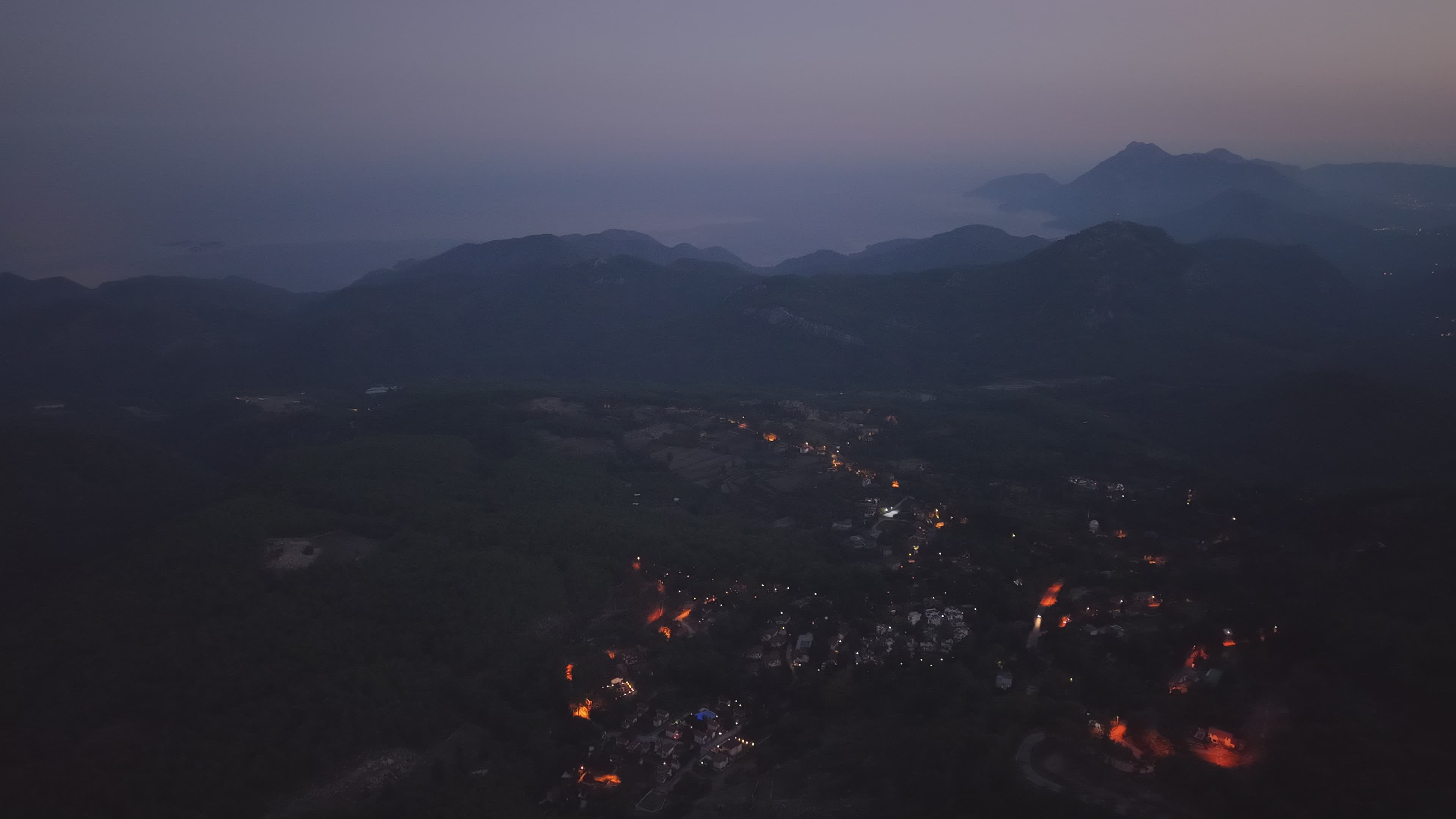 Aerial View of Village at Dusk with Lights Free Stock Video Footage ...