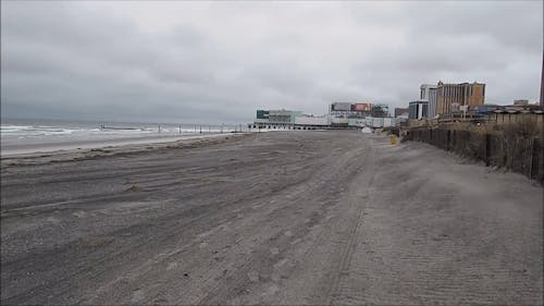 A Boardwalk Built On The Beach Sand