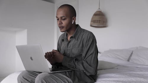 A Man In A Video Conference Call Working From Home