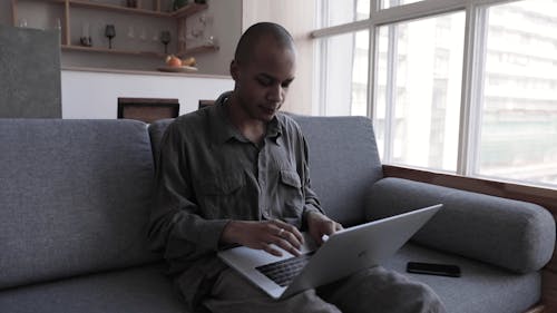 Man Using A Laptop