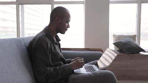 Man Using A Computer Laptop