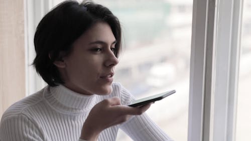 Woman Having A Coversation On Her Smartphone