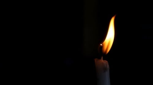 Close Up of Candle Blowing Out