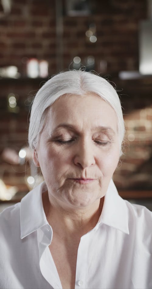 Close-up Footage Of An Elderly Woman In Self Isolation