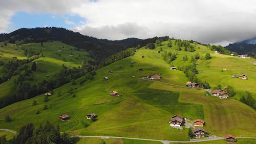 An Aerial Footage of a Village in the Swiss Mountain