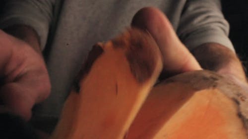 Close-up Shot of Peeling of Sweet Potato