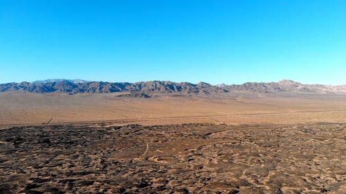 Drone Shot Pushing Into the Mountain Range on the Desert