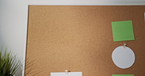 Posting Blank Papers On A Cork Board