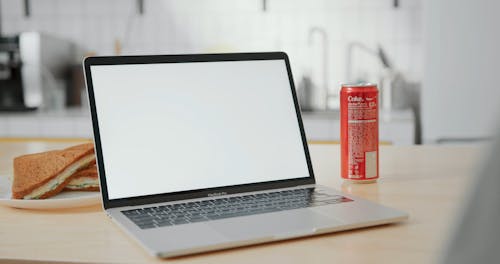 An Open Laptop Placed Over A Table