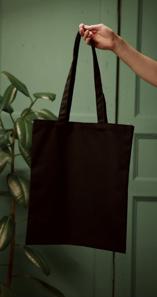 Showing A Dark Colored Reusable Shopping Bag