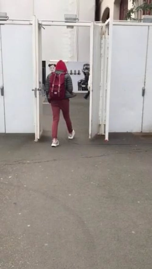 Men Walking In And Out Of An Open Door