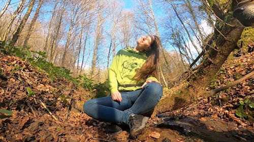 A Woman Feeling Relax In The Forest