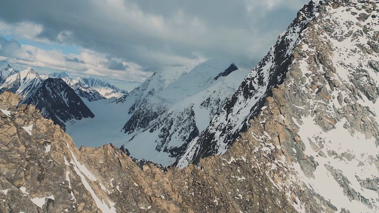 Drone Shot of the Mountains Covered with Snow Free Stock Video Footage ...