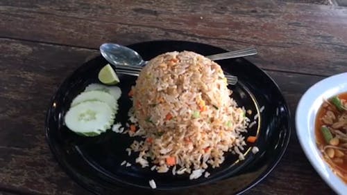 A Serving Of Fried Rice And Mix Vegetable For A Meal