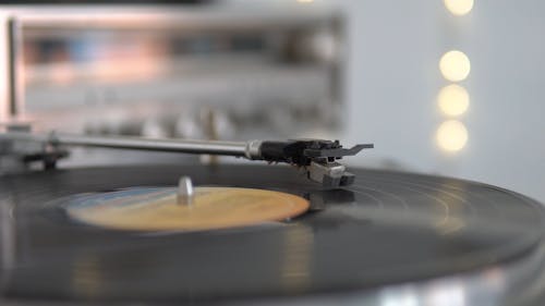 Close Up Of A Vintage Record Player With A Vinyl Record Spinning On The Turntable Free Stock Video